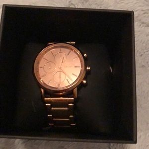 DKNY rose gold mirror face chronograph watch